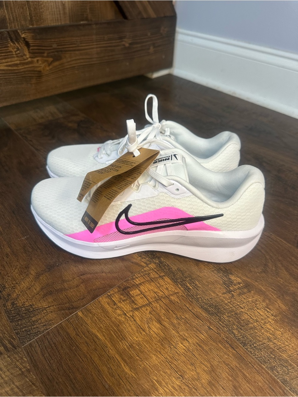 Nike Women's White Sneakers with Pink and Black Swoosh